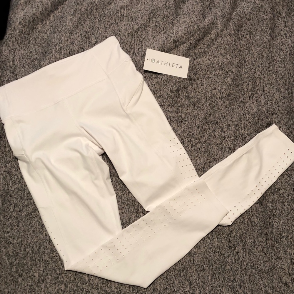 Athleta Contender 7/8 tight with pockets/laser cut